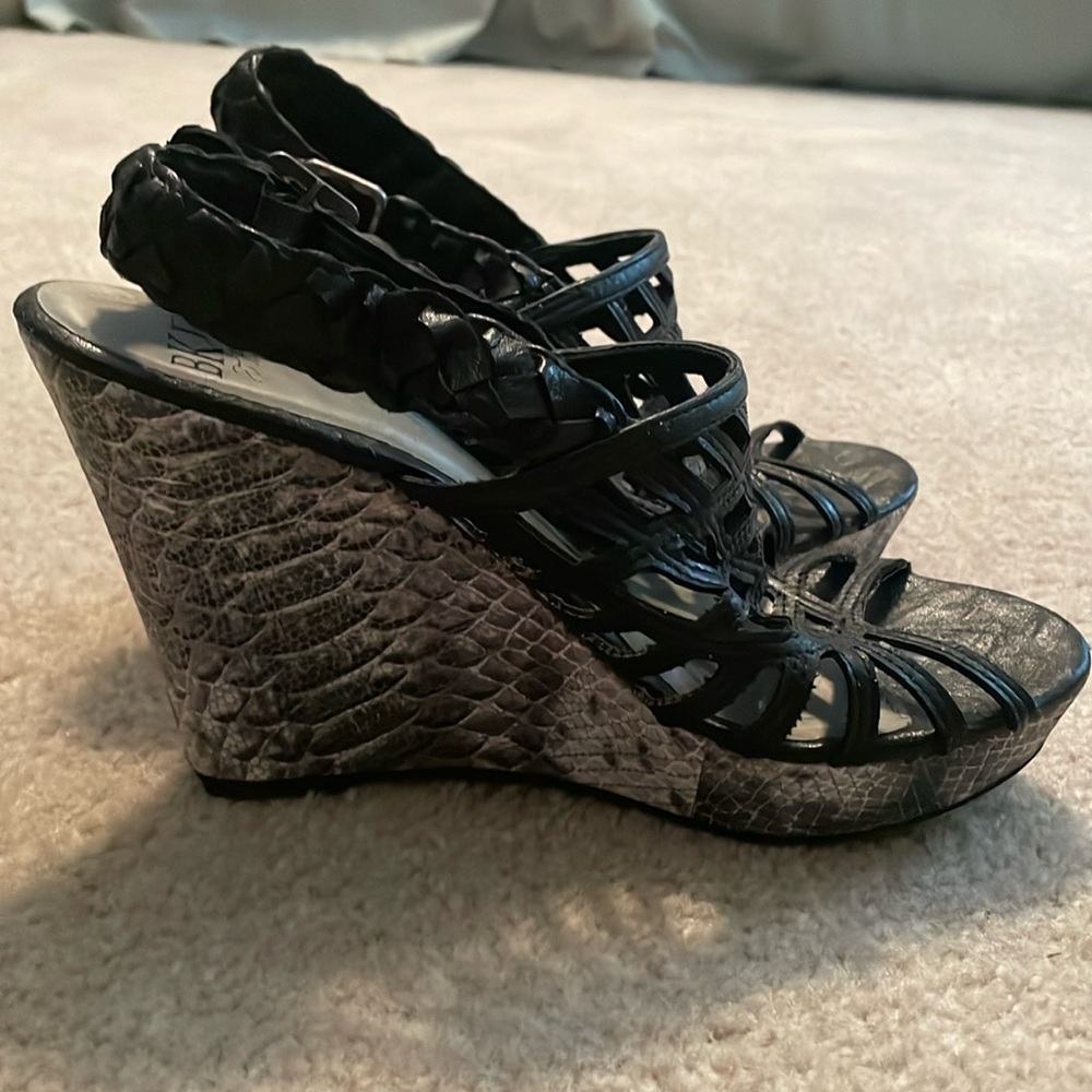 Black snakeskin heels from the Buckle.